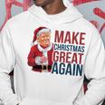 面白いクリスマスグレートアゲイントランプサンタファンusaホリデー 2024 パーカー 面白い贈り物