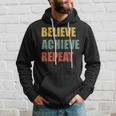 Believe Achieve Repeat Motivational Ambition Inspiration パーカー 彼への贈り物