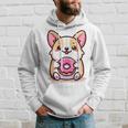 かわいいコーギーのドーナツを持つ漫画の犬愛好家アートキッズ。 パーカー 彼への贈り物