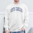ノースカロライナ代表チームのスタイル ネイビーテキスト 長袖tシャツ スウェットシャツ 高齢者への贈り物