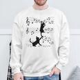 楽譜で遊ぶ面白い猫 スウェットシャツ 高齢者への贈り物