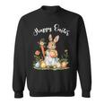 ハッピーイースターバニーニンジンイースターエッグ イースターラビットアートワーク スウェットシャツ