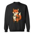 朝のコーヒーを楽しむ居心地の良いキツネ。 スウェットシャツ