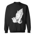 祈るイエスの手 スウェットシャツ