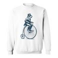 ビンテージのペニーファージング自転車に乗る粋なカエルのサイクリスト スウェットシャツ