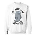 マナティーに気を取られる かわいい 海の動物 マナティー スウェットシャツ