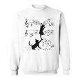 楽譜で遊ぶ面白い猫 スウェットシャツ