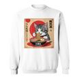背中にラーメンを食べる緑色の目を持つ日本猫のデザイン。 スウェットシャツ