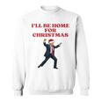 面白いトランプサンタハット、クリスマスに家に帰るよ 長袖tシャツ スウェットシャツ