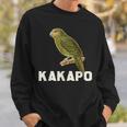 かわいいカカポの鳥が木に座っている スウェットシャツ 彼への贈り物