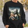 エイリアンホールディングヒューマンベイビーufo地球外接触tシャツ スウェットシャツ 彼への贈り物
