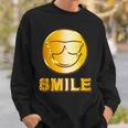 ゴールデン スマイル（フェイク ゴールド風）スマイリー フェイス ニコニコ 笑顔 サングラス 面白い 色 スウェットシャツ 彼への贈り物