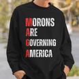 モロンはアメリカを支配している政治的ユーモアの自由のスピーチ スウェットシャツ 彼への贈り物