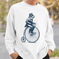ビンテージのペニーファージング自転車に乗る粋なカエルのサイクリスト スウェットシャツ 彼への贈り物