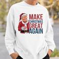 面白いクリスマスグレートアゲイントランプサンタファンusaホリデー 2024 スウェットシャツ 彼への贈り物