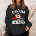 カナダはウクライナのウクライナのカナダの旗のtシャツで立ちます スウェットシャツ 彼女への贈り物