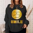 ゴールデン スマイル（フェイク ゴールド風）スマイリー フェイス ニコニコ 笑顔 サングラス 面白い 色 スウェットシャツ 彼女への贈り物