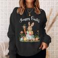 ハッピーイースターバニーニンジンイースターエッグ イースターラビットアートワーク スウェットシャツ 彼女への贈り物