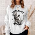 Bone-Chilling 本 スケルトン 読書 ブックワームブックラバーズ 長袖tシャツ スウェットシャツ 彼女への贈り物