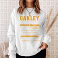 Oakleyオークリー 完全訳不明なネームシャツ フロントプリント 1Kana 長袖tシャツ スウェットシャツ 彼女への贈り物