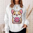 かわいいコーギーのドーナツを持つ漫画の犬愛好家アートキッズ。 スウェットシャツ 彼女への贈り物