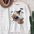 【ハロウィン特集】Usデザイン ハローキティ トリックオアトリート スウェットシャツ 年配の女性への贈り物