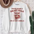 お前は利口なやつかおなら臭いのどっちかだ スウェットシャツ 年配の女性への贈り物