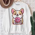 かわいいコーギーのドーナツを持つ漫画の犬愛好家アートキッズ。 スウェットシャツ 年配の女性への贈り物