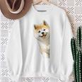 かわいい日本の秋田犬が角をのぞく犬好き。 スウェットシャツ 年配の女性への贈り物