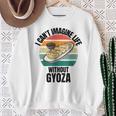 レトロ可愛い餃子 ギョーザなしでは人生は想像できない。 スウェットシャツ 年配の女性への贈り物