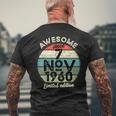1960年11月7日 65歳の誕生日 65歳 2025年 誕生日 メンズTシャツ バックプリント 高齢者への贈り物
