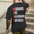 モロンはアメリカを支配している政治的ユーモアの自由のスピーチ メンズTシャツ バックプリント 彼への贈り物