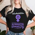 International Women's Day 2025 Accelerate Action Girls レディースTシャツ 彼女への贈り物