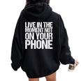 Live In The Moment Not On Your Phone Health Wellness レディース オーバーサイズ パーカー バックプリント Black