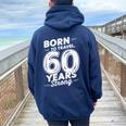 還暦祝い 旅行好き 父 母 男性 女性 60歳 レトロ おしゃれ 文字デザイン Born To Travel レディース オーバーサイズ パーカー バックプリント Forest