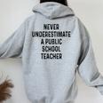 Never Underestimate A Publicchool Teacher Motivational レディース オーバーサイズ パーカー バックプリント Sport Grey