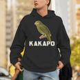 かわいいカカポの鳥が木に座っている パーカー