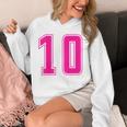 ピンク色背番号 10 チーム短大スポーツピンク色背番号付きユニフォーム パーカー