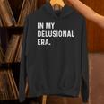 In My Delusional Era 面白い大人のユーモアの言葉 長袖tシャツ パーカー