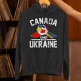 カナダはウクライナのウクライナのカナダの旗のtシャツで立ちます パーカー