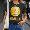 ゴールデン スマイル（フェイク ゴールド風）スマイリー フェイス ニコニコ 笑顔 サングラス 面白い 色 Tシャツ 彼女への贈り物