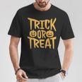 トリックオアトリートパンプキンフェイスハロウィングラフィック。 Tシャツ 面白い贈り物