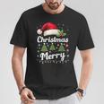メリークリスマスライト 赤いサンタ帽子 クリスマス ファミリー 男性 女性 Tシャツ 面白い贈り物