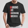 モロンはアメリカを支配している政治的ユーモアの自由のスピーチ Tシャツ 面白い贈り物