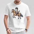 Niños Montar A Caballo Con Un Gato Es Amor Por El Caballo Camiseta unisex Regalos divertidos
