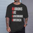 モロンはアメリカを支配している政治的ユーモアの自由のスピーチ Tシャツ 彼への贈り物