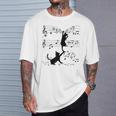 楽譜で遊ぶ面白い猫 Tシャツ 彼への贈り物