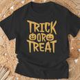 トリックオアトリートパンプキンフェイスハロウィングラフィック。 Tシャツ 高齢者への贈り物